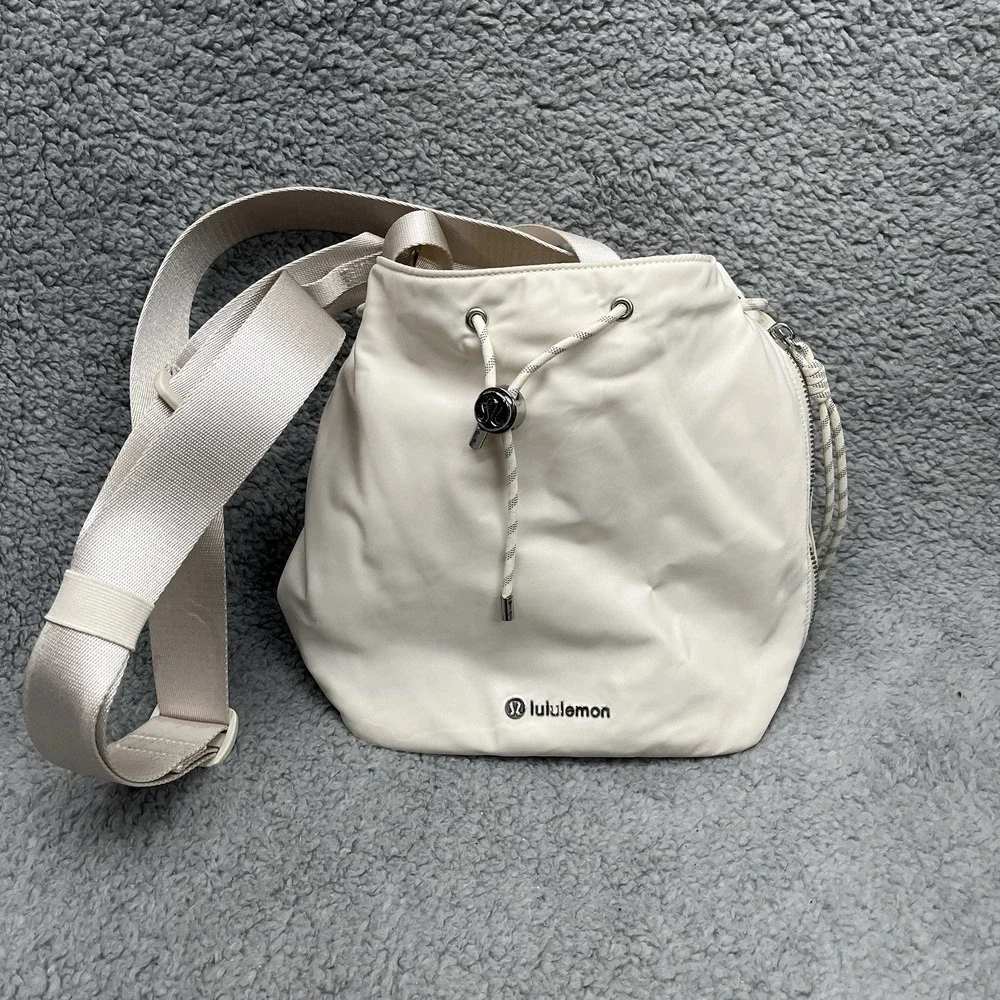 Lululemon Drawstring Bucket Crossbody Bag 5L Light Ivory Nylon Adjustable READ